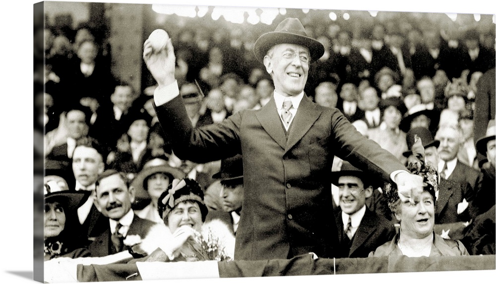 28th President of the United States. President Wilson throwing out the ceremonial first ball on opening day of the 1916 ma...