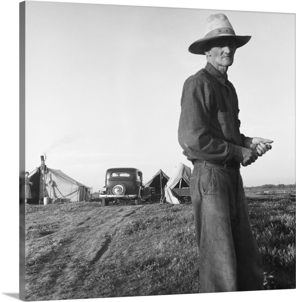 Refugees from the Oklahoma drought camping by the roadside. Photograph by Dorothea Lange, 1935.