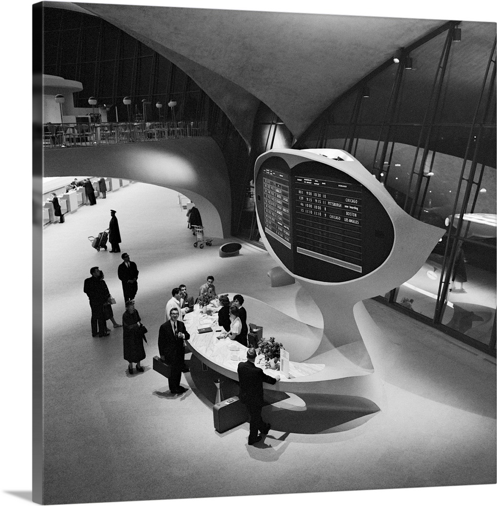 The information desk in the Trans World Airlines Terminal at Idlewild (now JFK) Airport in New York, New York. Photograph ...
