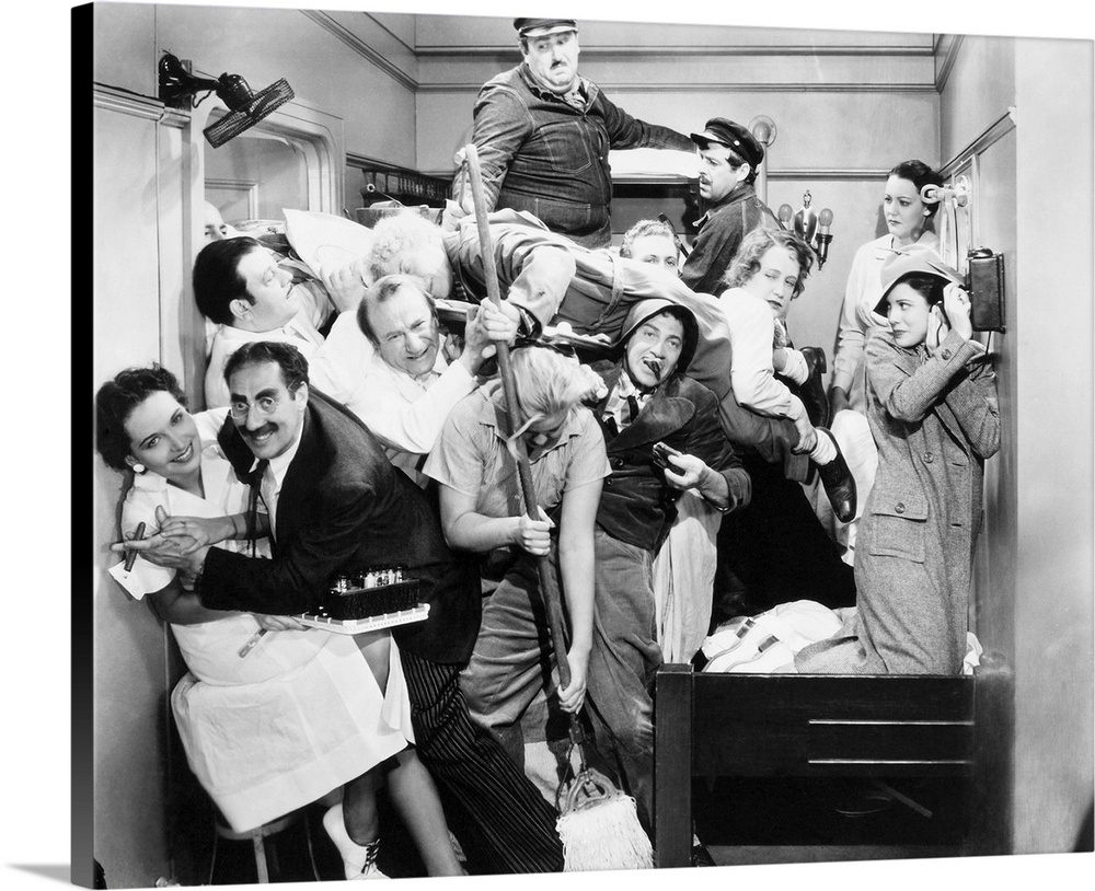 Some of the ship's crew join the Marx Brothers in their cabin in 'A Night at the Opera,' 1935.