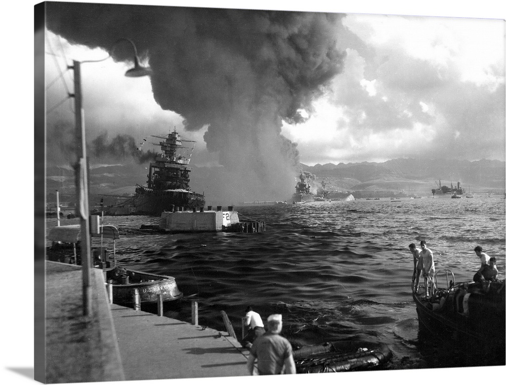 The USS California (left) damaged during the Japanese attack on the U.S. naval base at Pearl Harbor, Hawaii, 7 December 19...