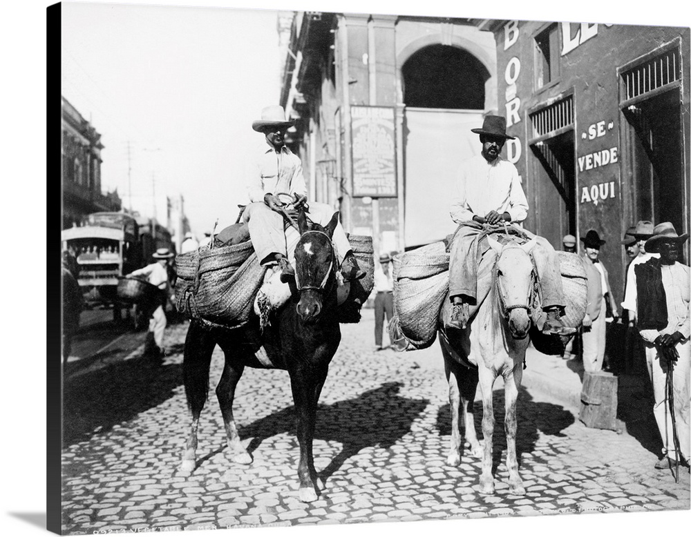 Cuba, Vendors, C1904. Two Men On Horseback Carrying Baskets Of Vegetables To Sell In Havana, Cuba, C1904.