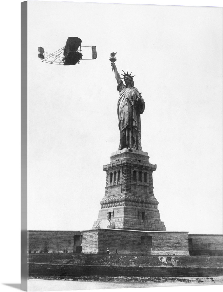 Wilbur Wright flying past the Statue of Liberty on his way from Governor's Island to Grant's Tomb during New York City's H...