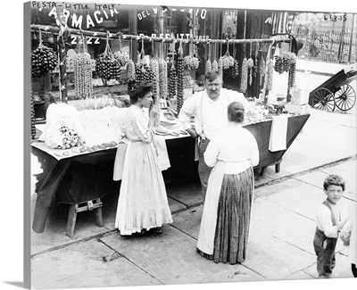 Women shopping at a street vendor's table in Little Italy, New York City, c1905