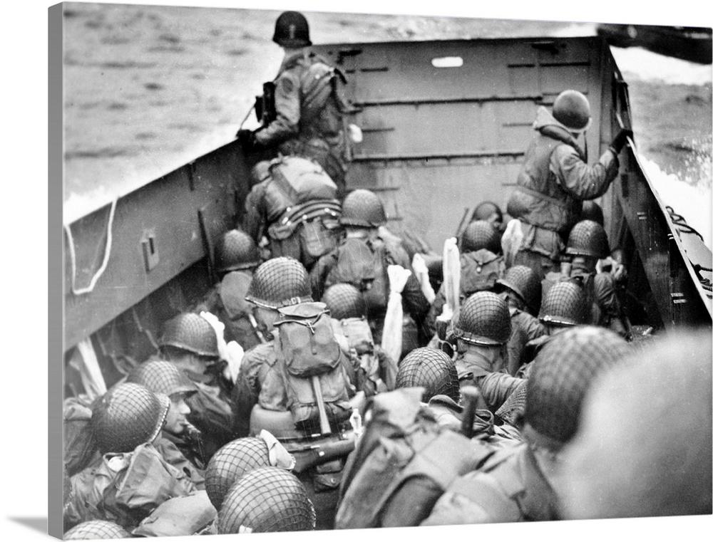 U.S. Army assault troops aboard the Coast Guard landing craft off the coast of Normandy, France, 6 June 1944.