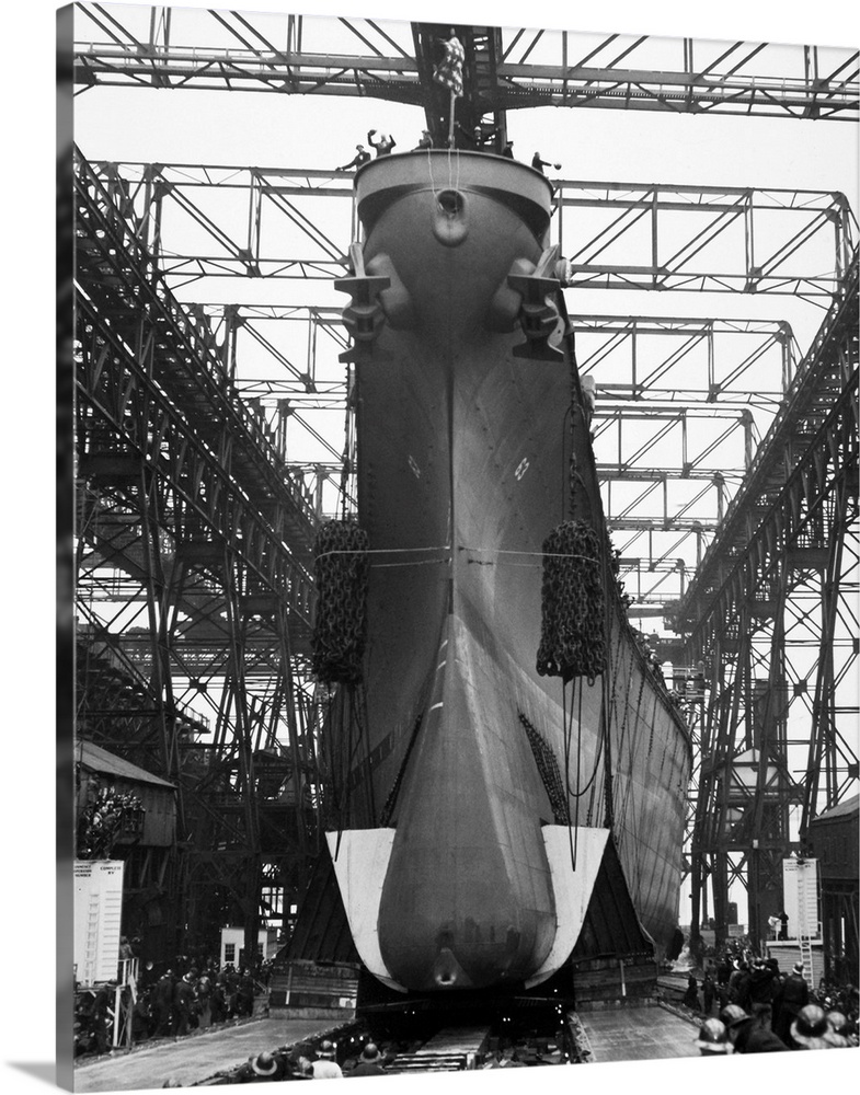 USS Missouri, a 45,000 ton battleship, starts down the ways at her launching at the New York Navy Yard, Brooklyn, during W...