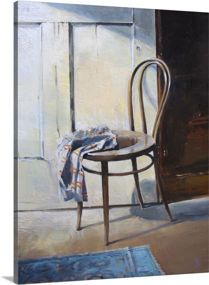 Earthy tones and soft brush strokes create an everyday towel that sits restfully on a bentwood chair.