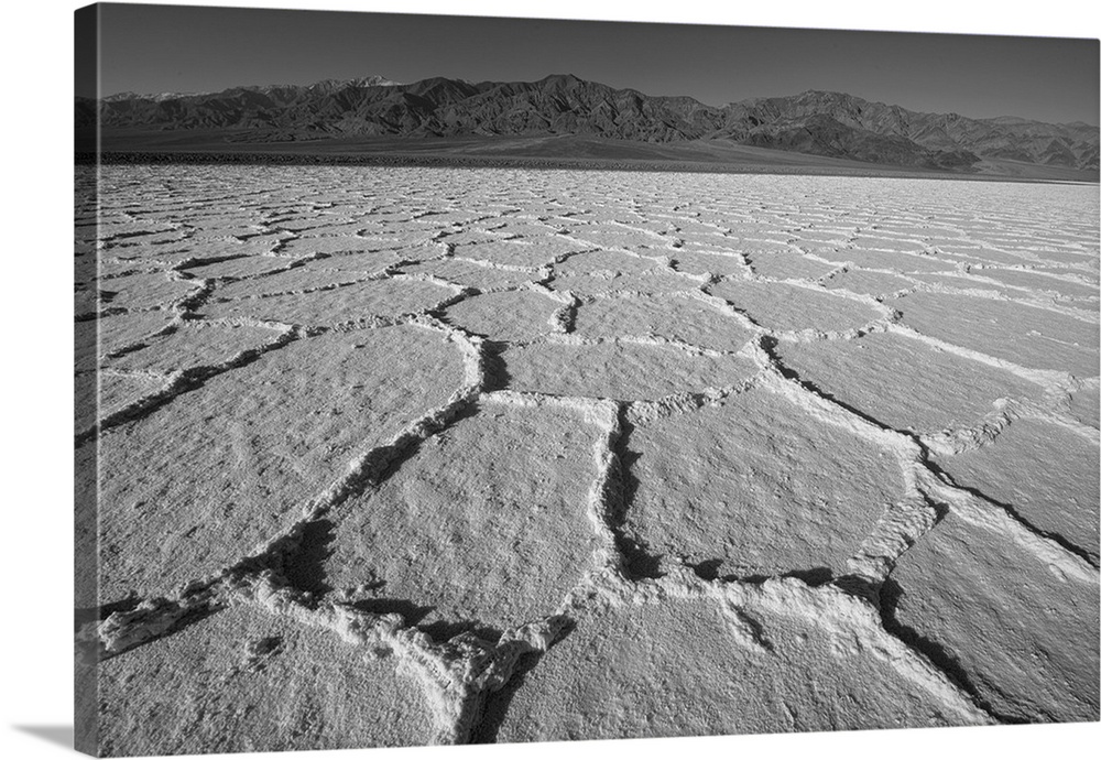 Black and white image of dry salt flats in Death Valley, California.