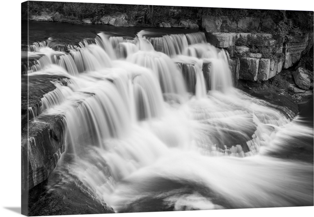 Long exposure photo of rushing waterfalls in Taughannock Falls State Park, New York.