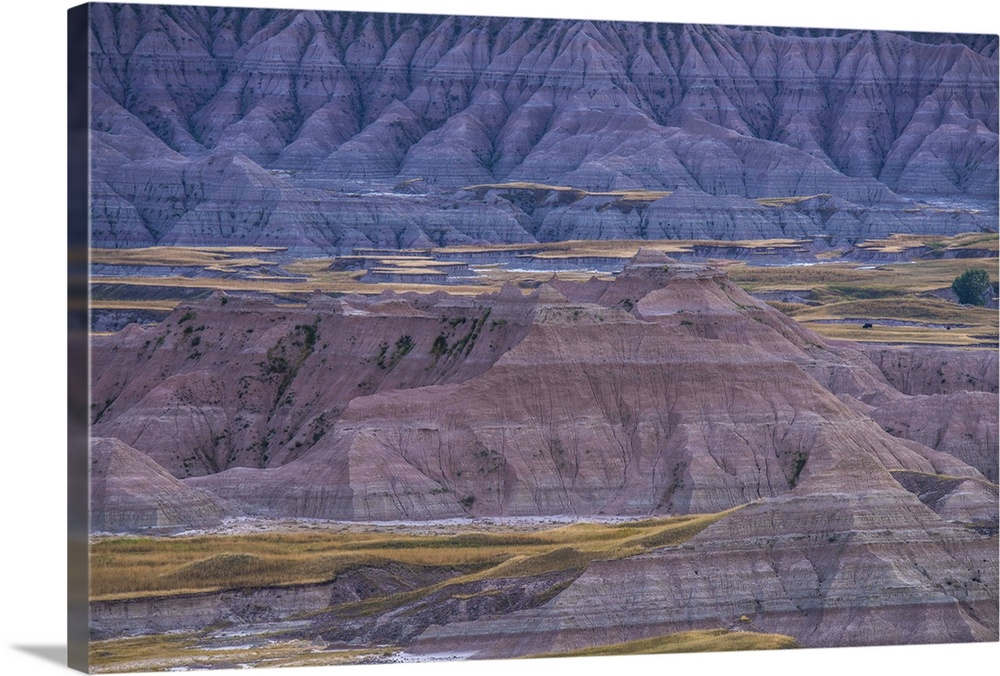 Sedimentary rock layers visible in the eroded landscape of Badlands National Park, South Dakota.