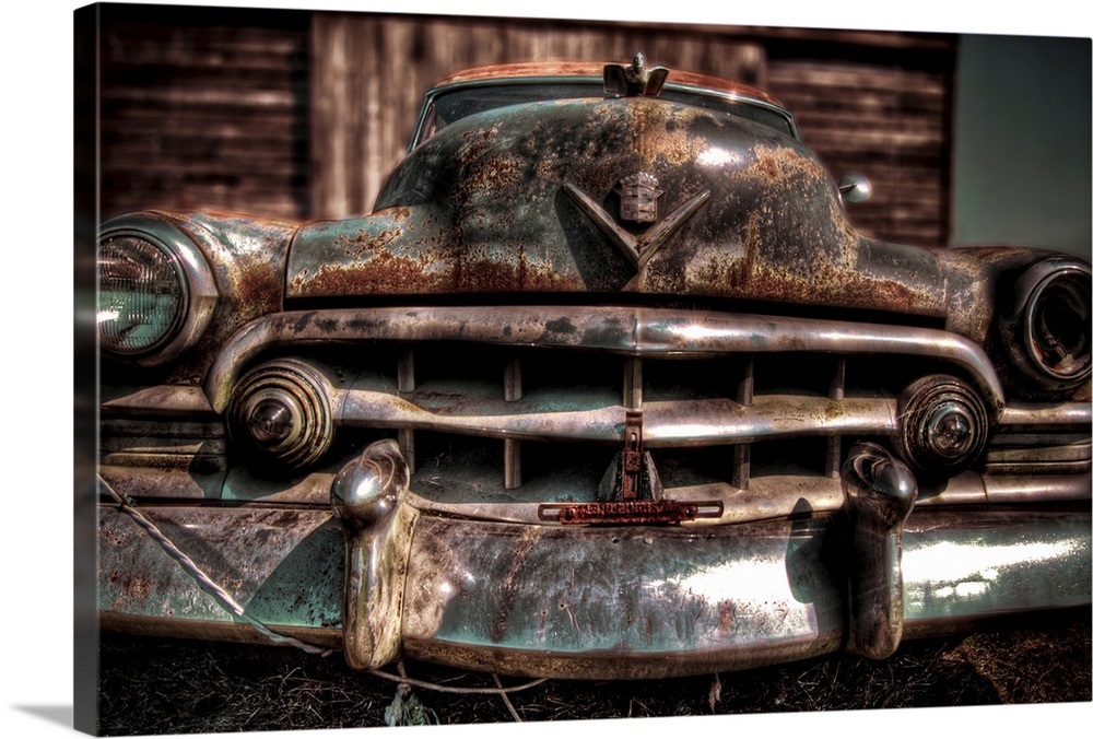 A 1950's American Cadilac car with rust and chrome bumper Wall Art
