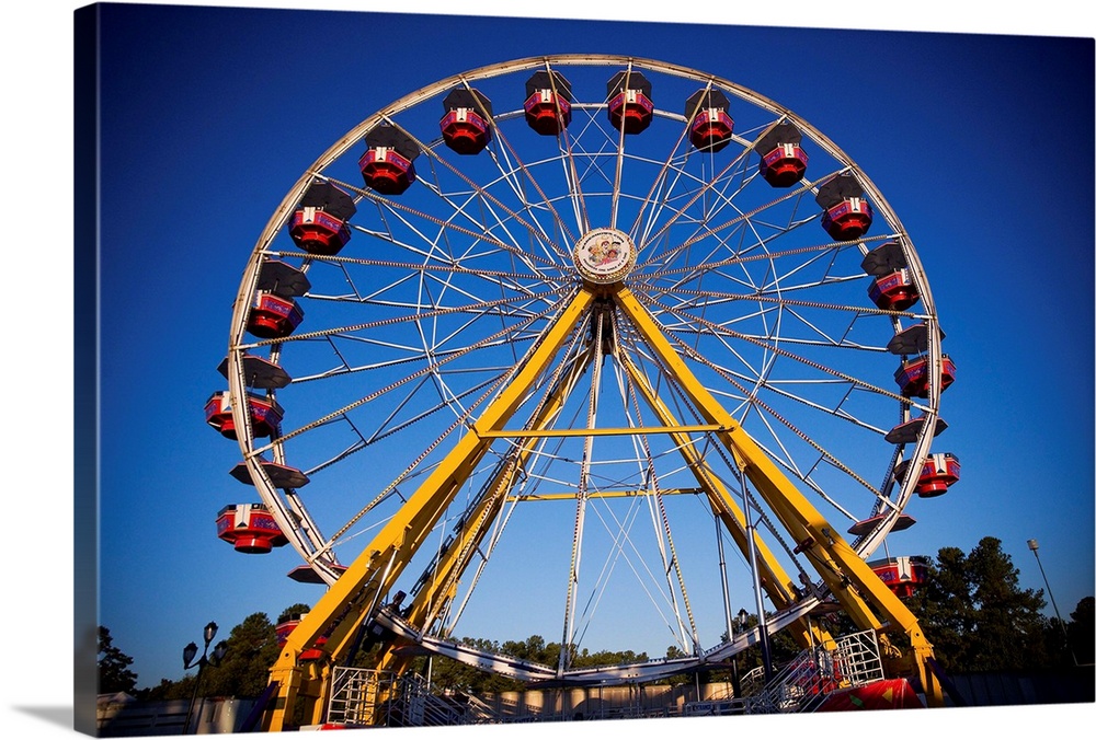 A colorful Ferris Wheel at the North Carolina State Fair in Raleigh, NC.