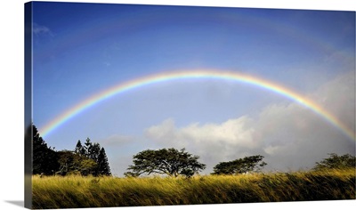 A double rainbow above countryside