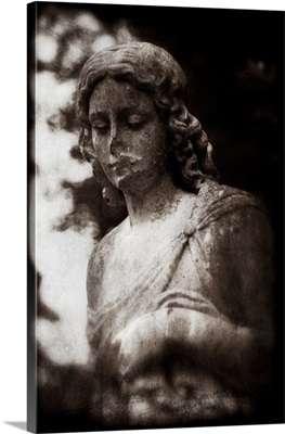 A female statue in cemetery