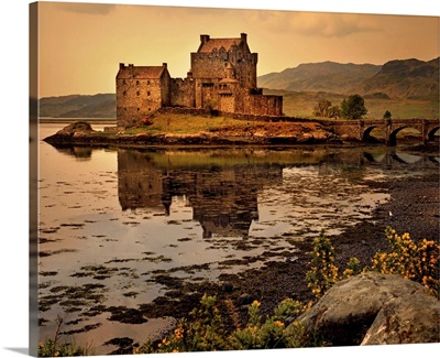 An ancient castle beside a loch in Scotland