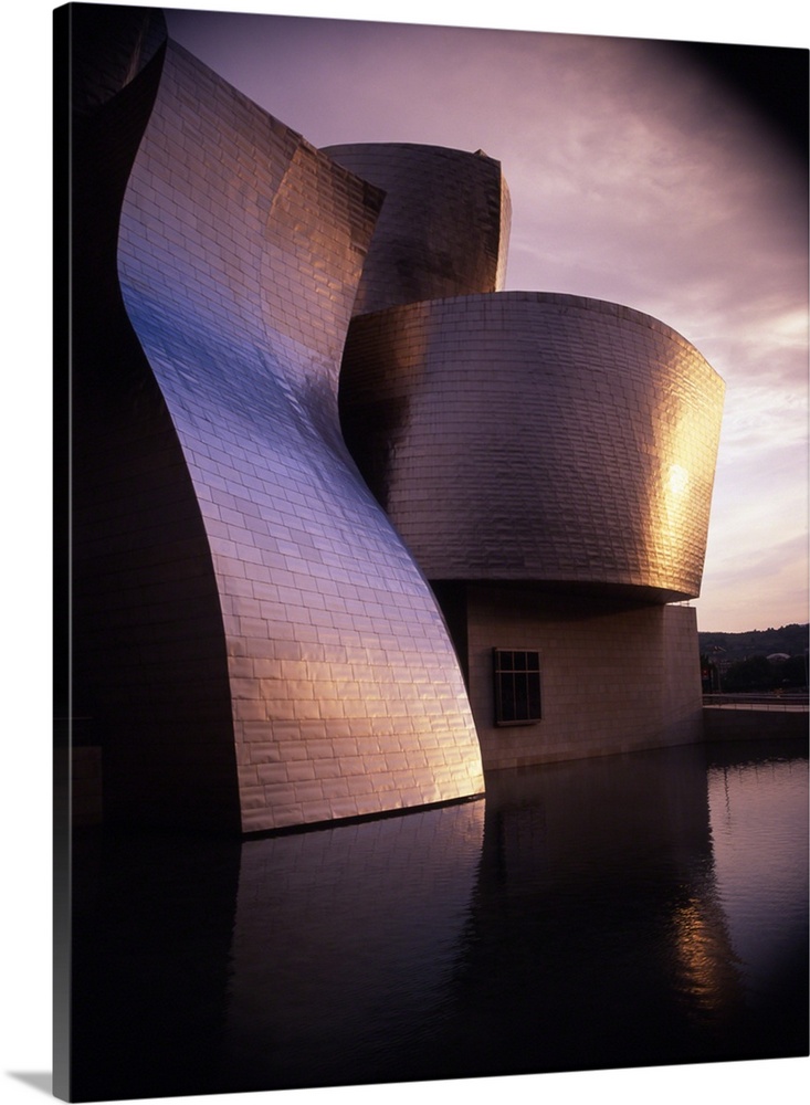 An exterior shot of the architecture of the Guggenheim Museum in Bilbao, Spain