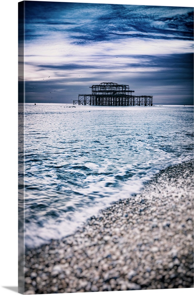 Brighton is a seaside town in the south of England, UK. The West Pier is a pier in Brighton, England. It was designed by E...