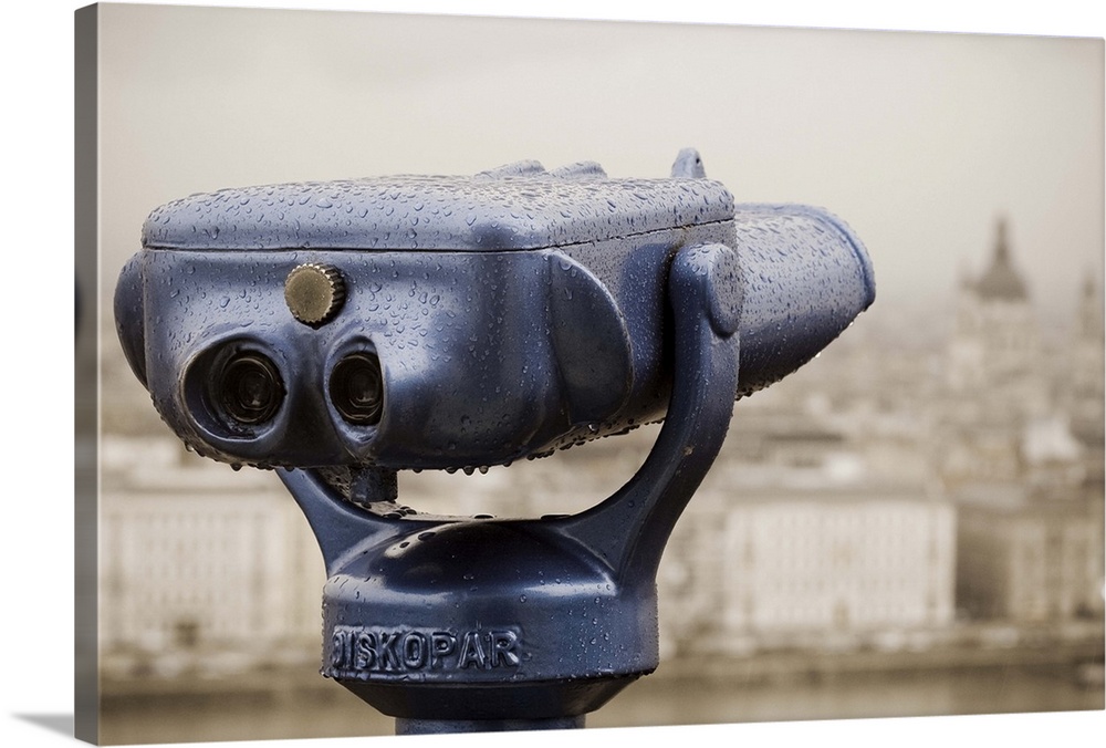 Blue binoculars in Budapest in a rainy day.