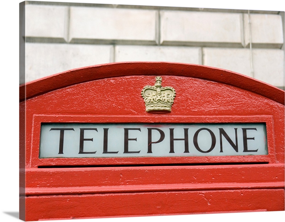 Classic UK red telephone box, designed by Giles Gilbert Scott. London, England. UK.