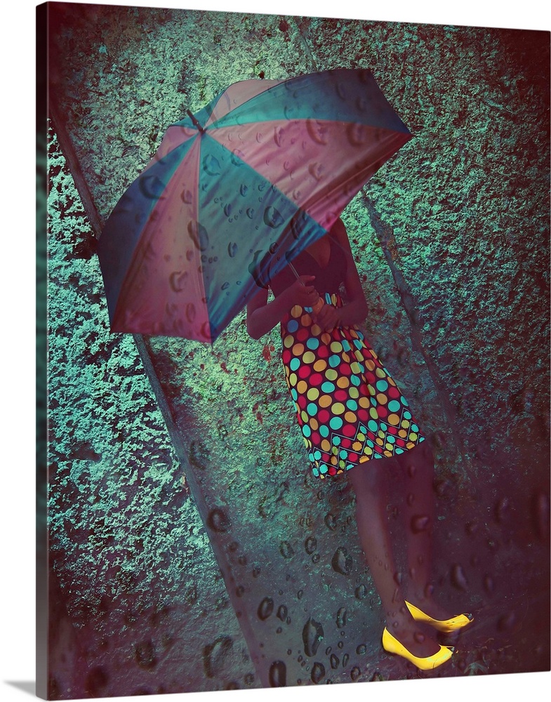 A young woman wearing a spotted dress and yellow shoes holding an umbrella