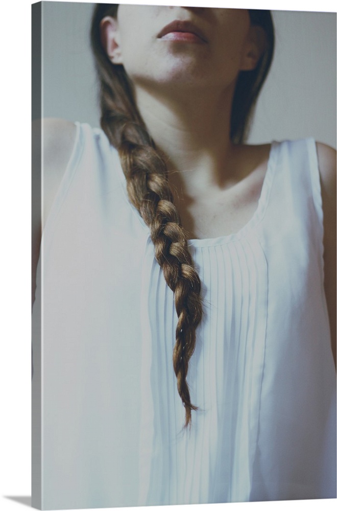 faceless portrait of a girl with pale light and braided hair