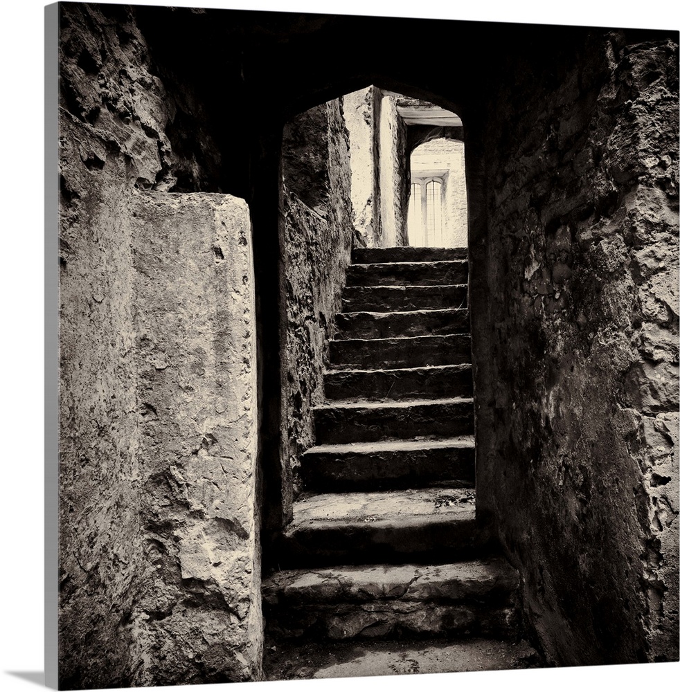 Doorway and steps in medieval castle ruins. Beupre Castle, Wales