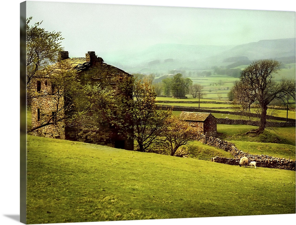 A stone cottage with rolling farm fields