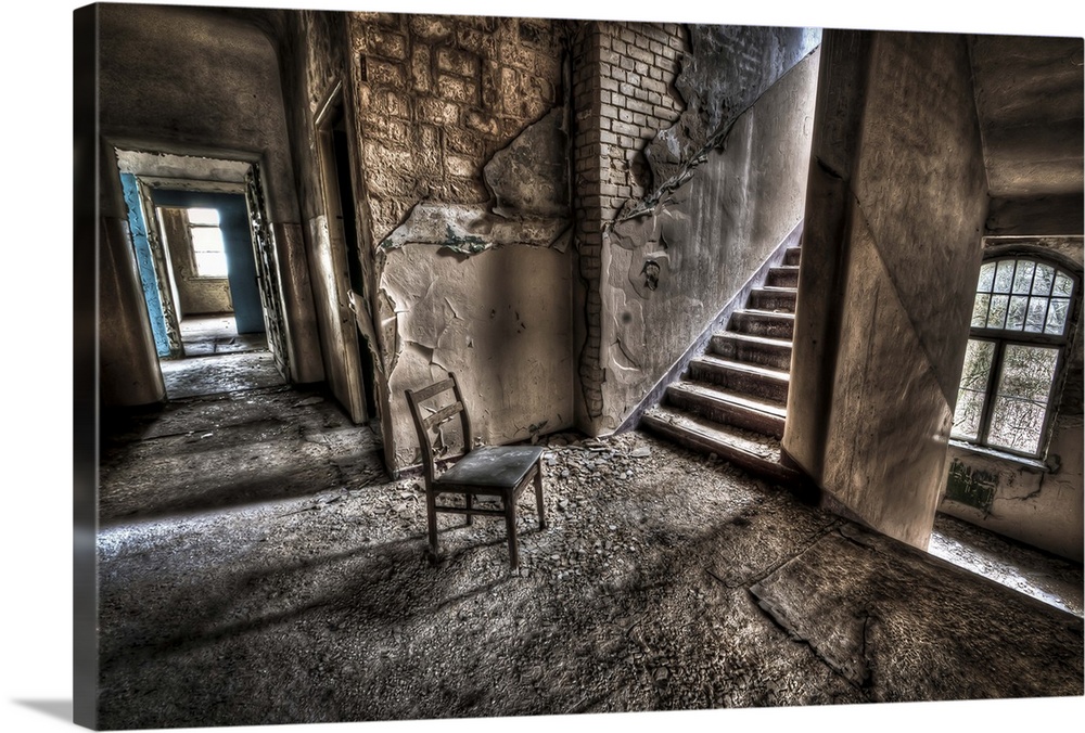 Abandoned lunatic asylum north of Berlin, Germany. Chair with stairs
