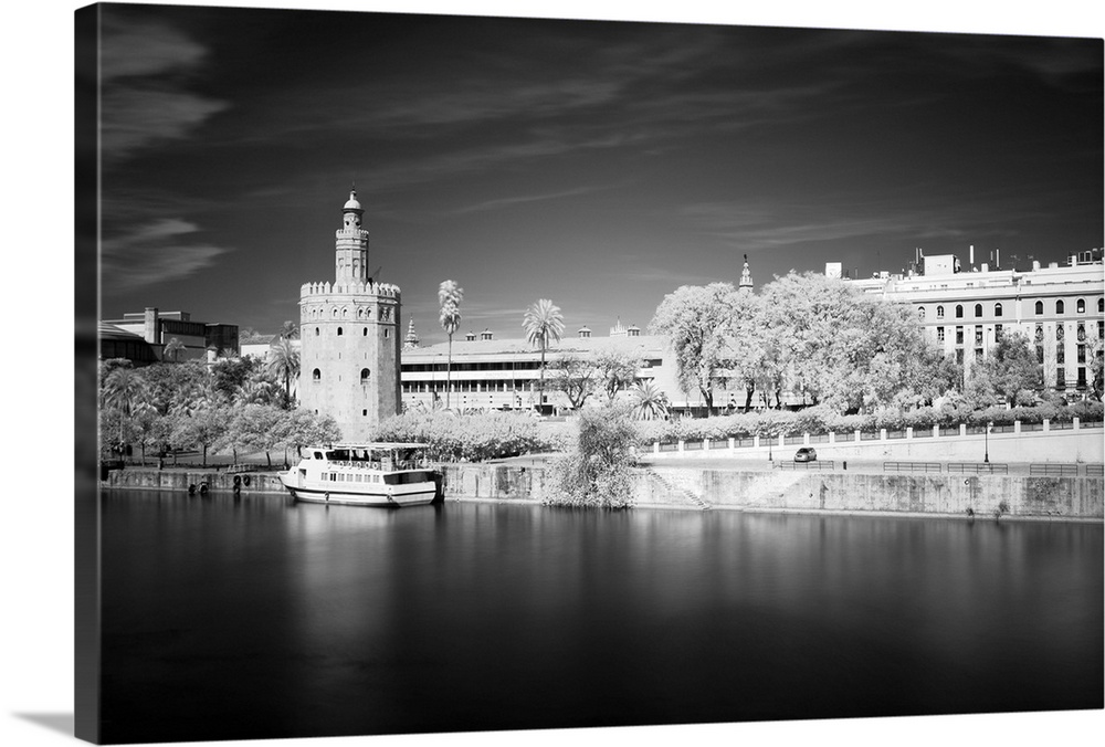 Infrared image of yhe Golden Tower (12th century Moorish building) by the Guadalquivir river, Seville, Spain.