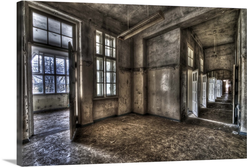 Abandoned lunatic asylum north of Berlin, Germany. Empty room with corridor.