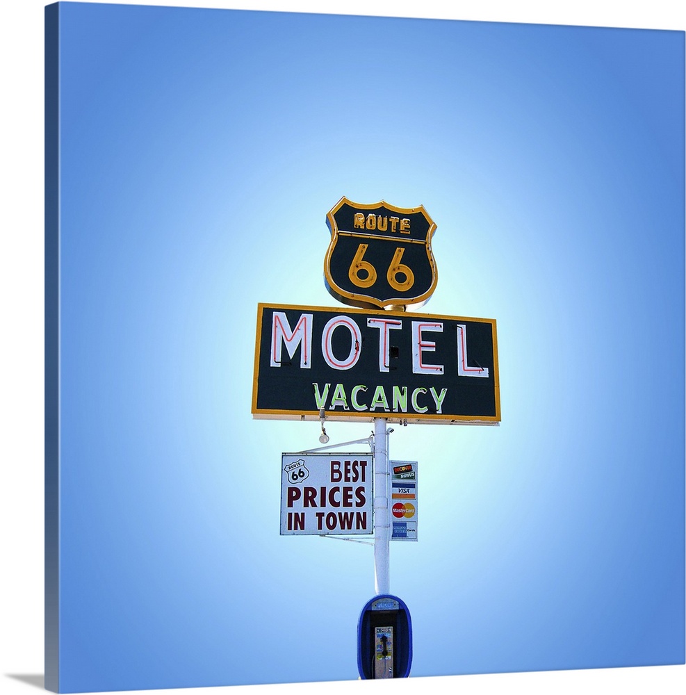 Blue sky with vintage neon street sign in USA.