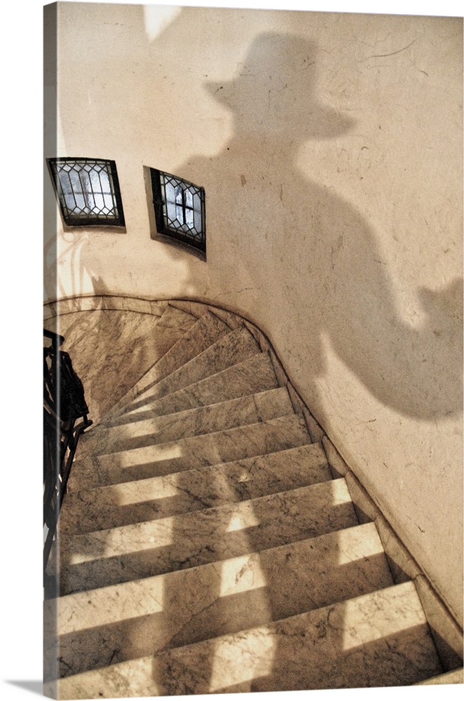 Shadows on a staircase of a male figure