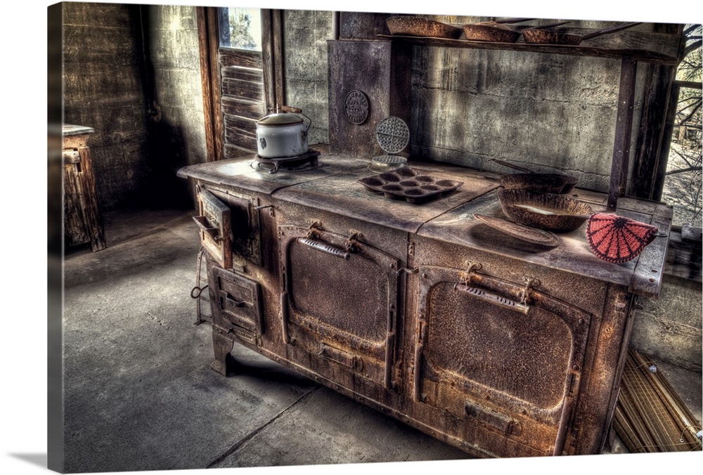 An old, rusty cook stove found in the gold mine kitchen.