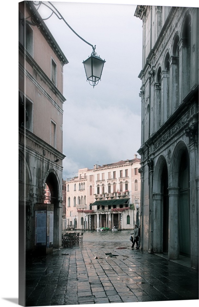 Looking to a nearly deserted campo, in Venice, Italy, in the springtime.