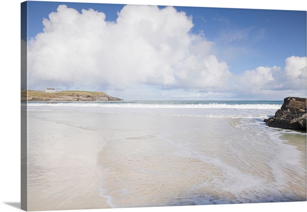 Sunlit beach at Port of Ness, Lewis, Outer Hebrides, Scotland, UK
