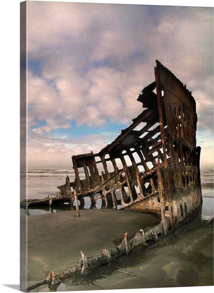 Shipwreck on a beach with rust