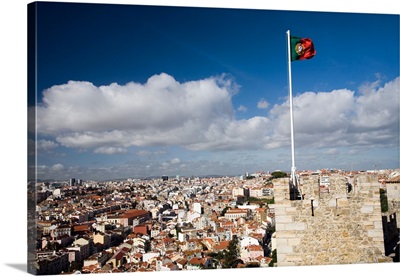 The Portuguese flag fluttering over Lisbon on Saint George castle
