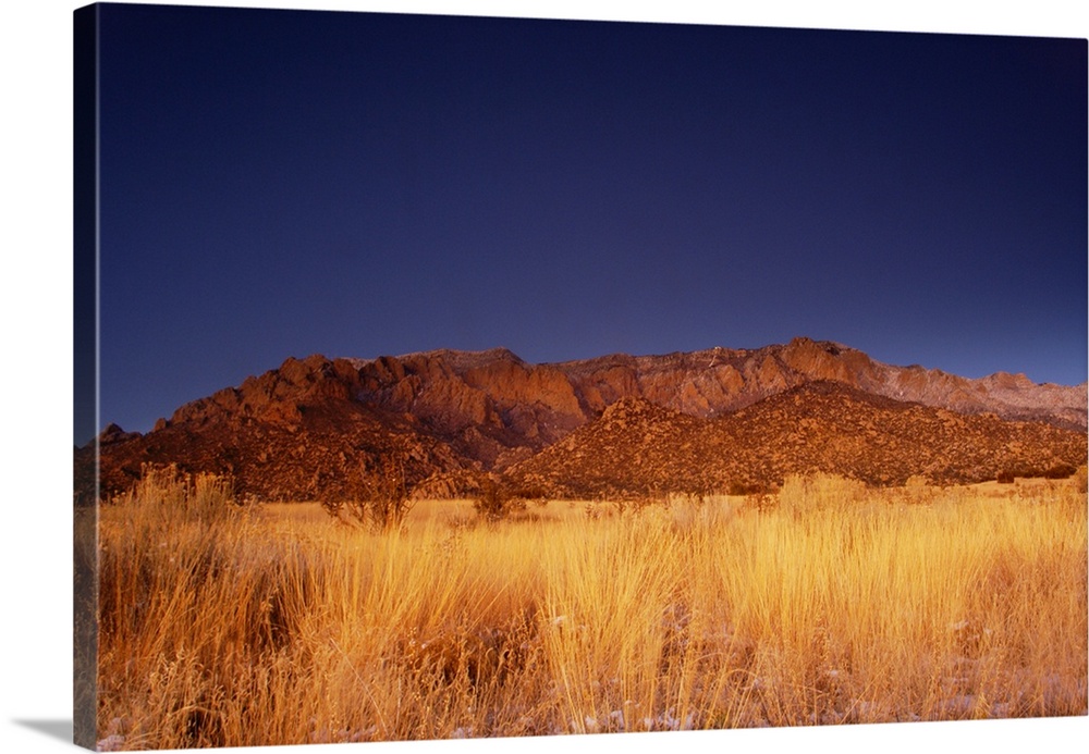 travel destinations: the sandia mountains desert twilight landscape glows, albuquerque, new mexico