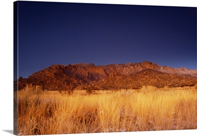 The Sandia mountains desert twilight landscape glows, New Mexico