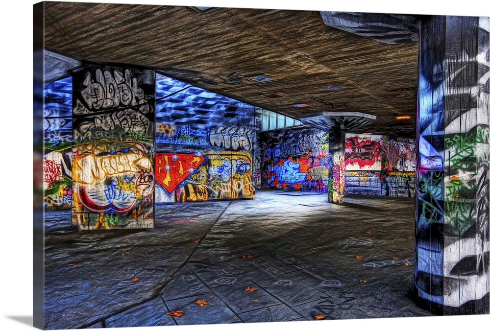 The underground skaters area underneath londons south bank national theatre heavily covered in graffiti