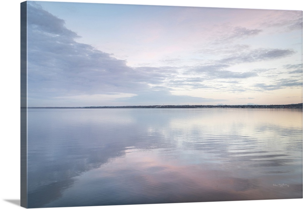 Clouds reflected in calm waters of Bellingham Bay Washington.