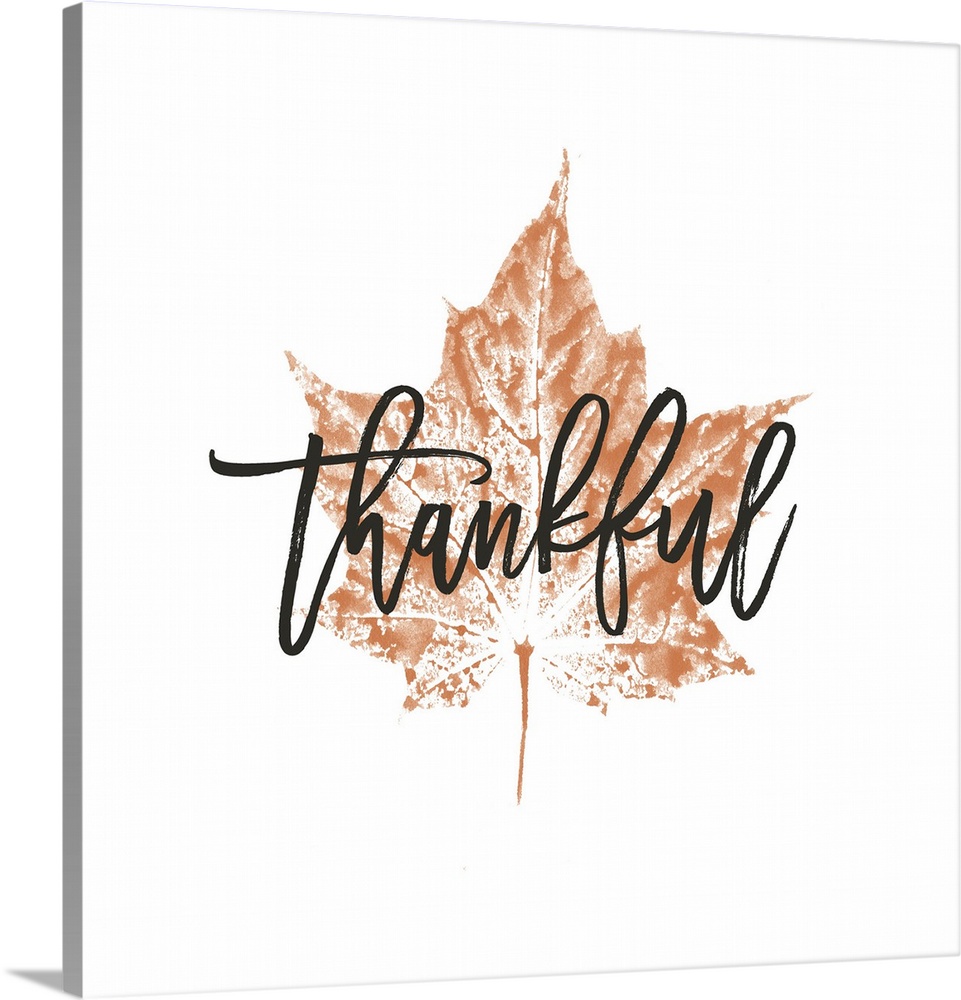 "Thankful" over a metallic bronze leaf on white.
