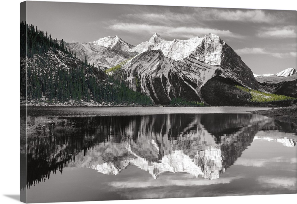 Photograph of a sunrise at Emerald Lake, Yoho National Park British Columbia in black and white with green trees.