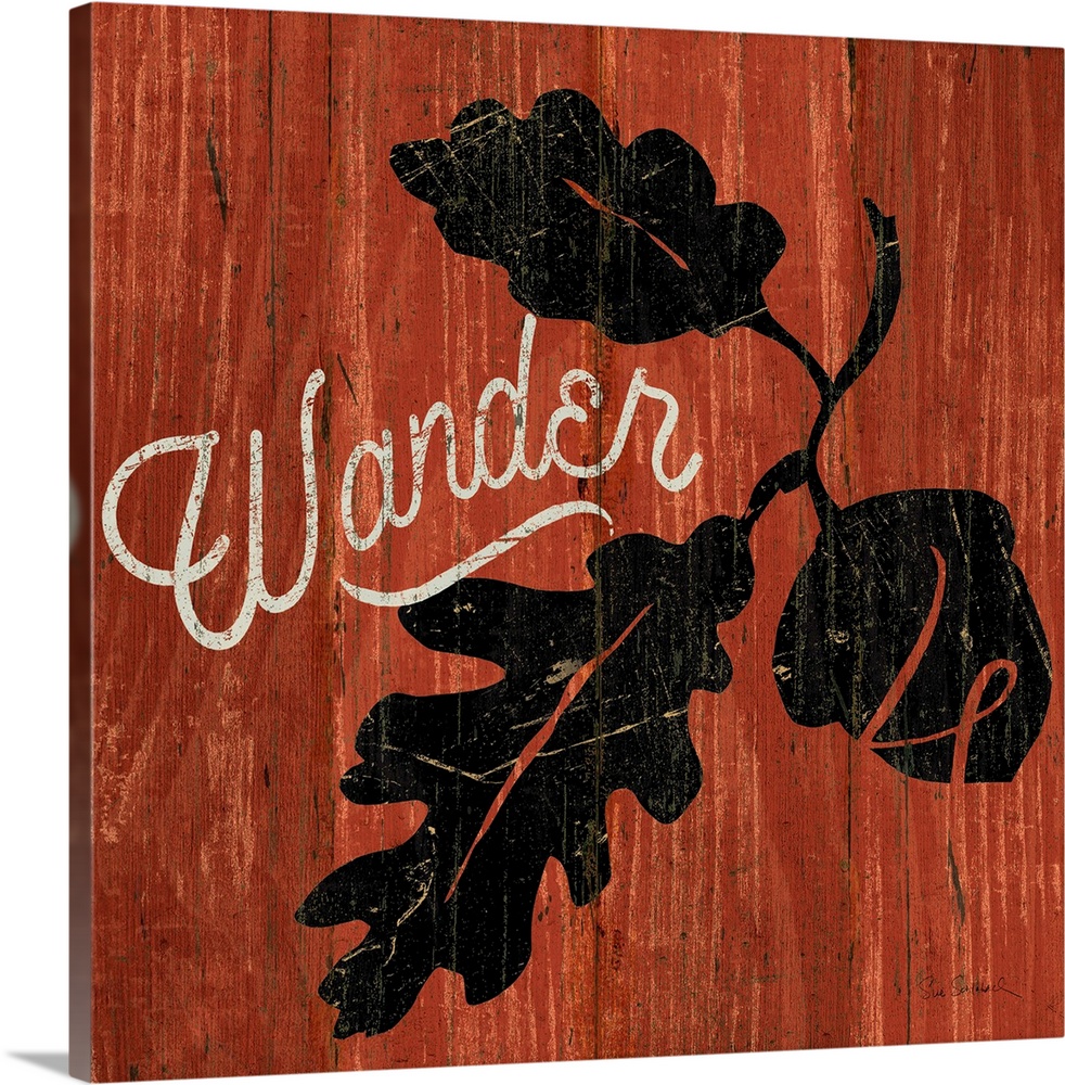 Contemporary artwork of a stenciled leaf with lettering in it against a wooden background.