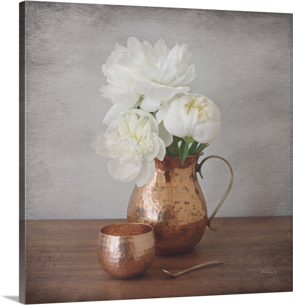Still life photograph of a copper vase full of white peonies with a distress overlay.