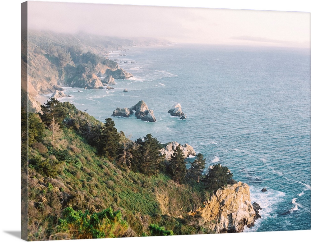 A high angled photograph of the rocky cliffs of Big Sur, California.