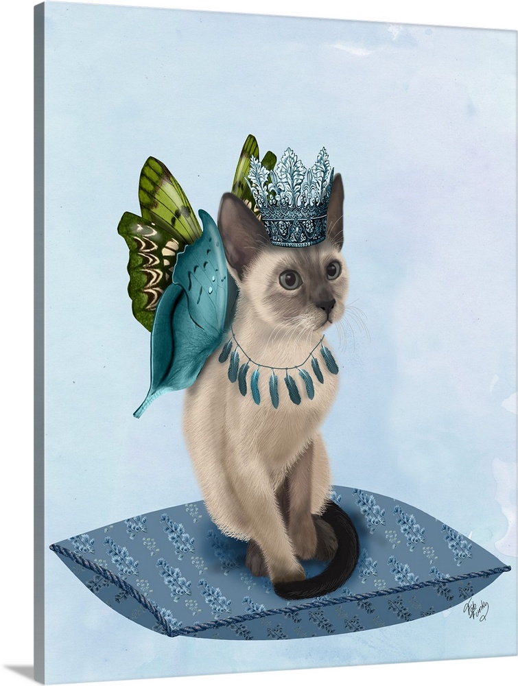 A cat with butterfly wings sitting on a pillow.