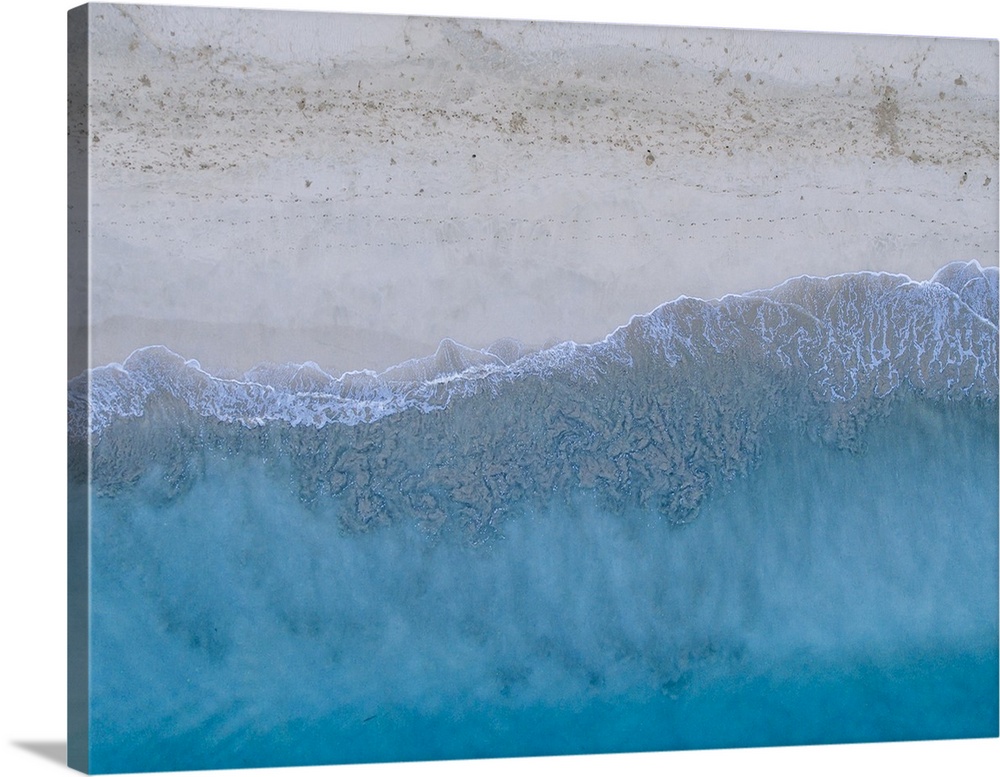 Aerial view of tropical blue ocean water on the Hawaiian coast.