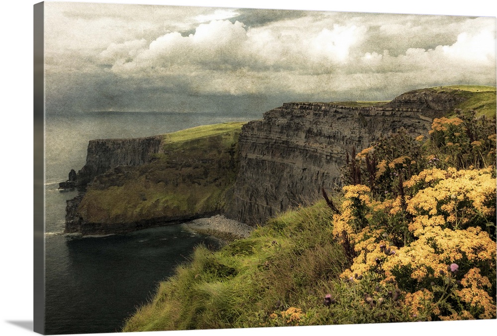 Fine art photo of cliffs on the Irish coast under a cloudy sky.