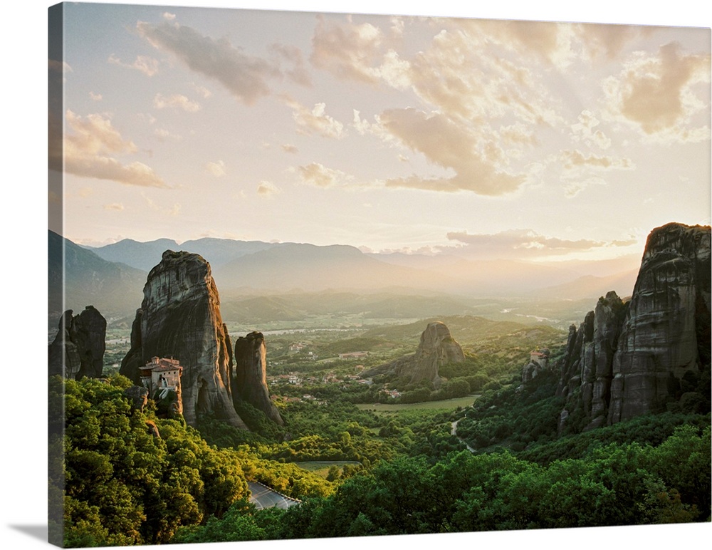 Photograph of ancient monoliths in the landscape, Meteora, Greece.